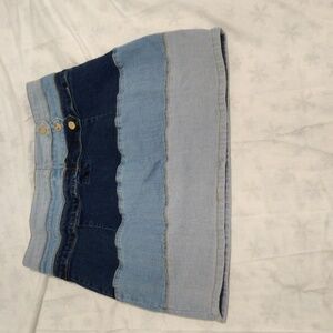 Akira. Blue contrast panel denim skirt with bottons.